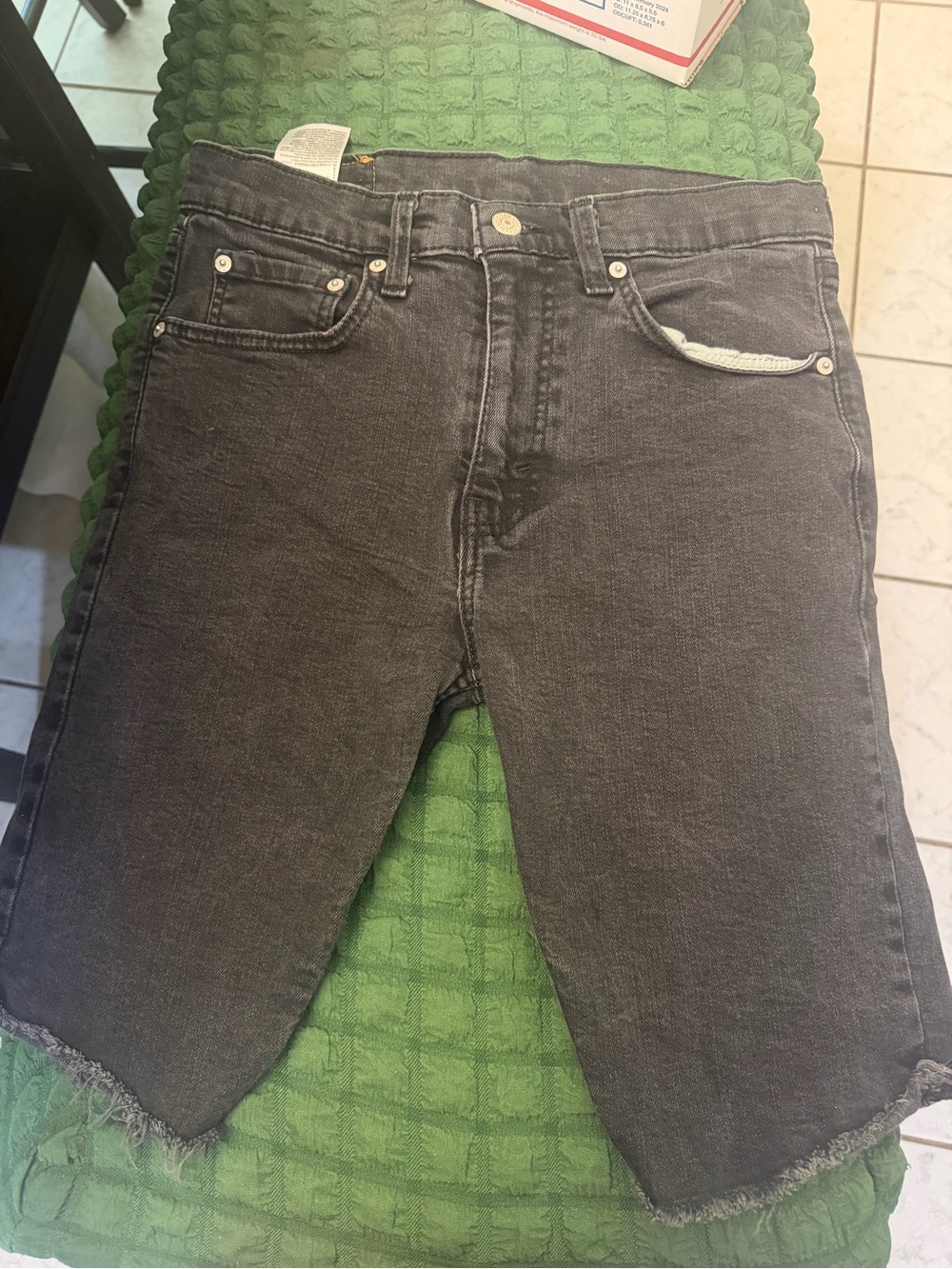 Levi's Washed Black Denim Cutoff Shorts